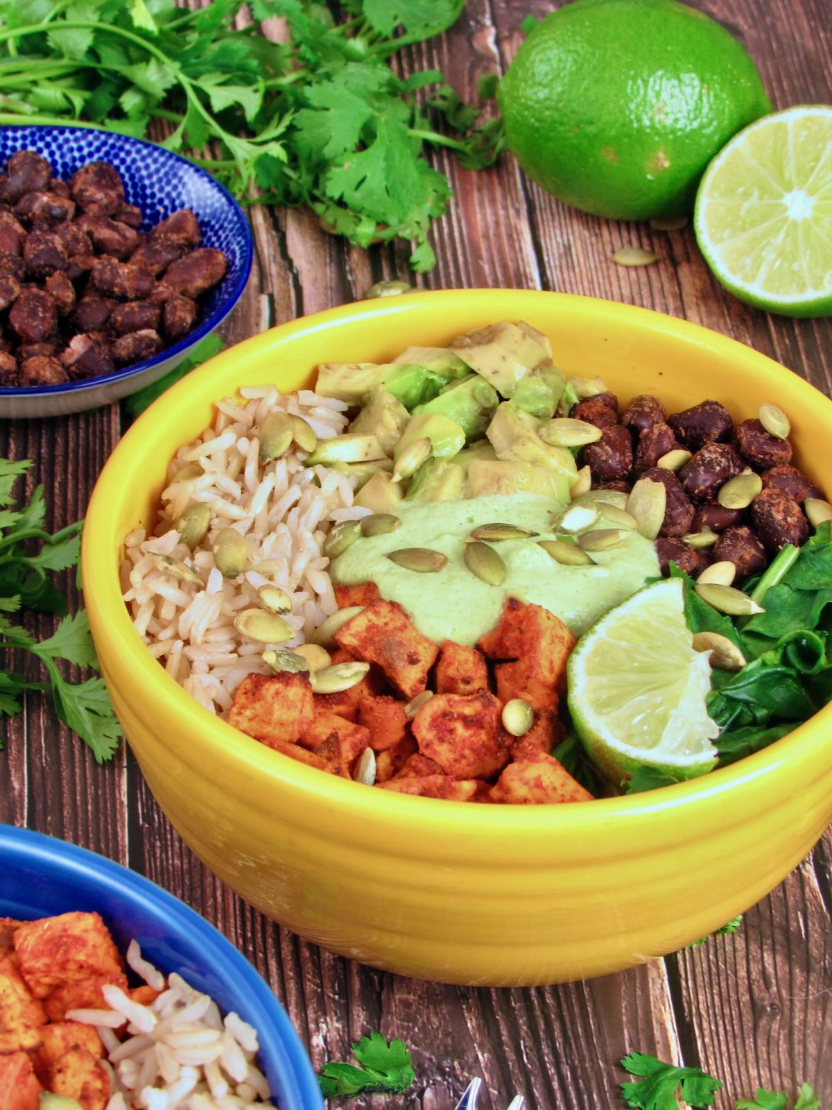 Sweet Potato Buddha Bowl with seasoned black beans and fresh veggies.