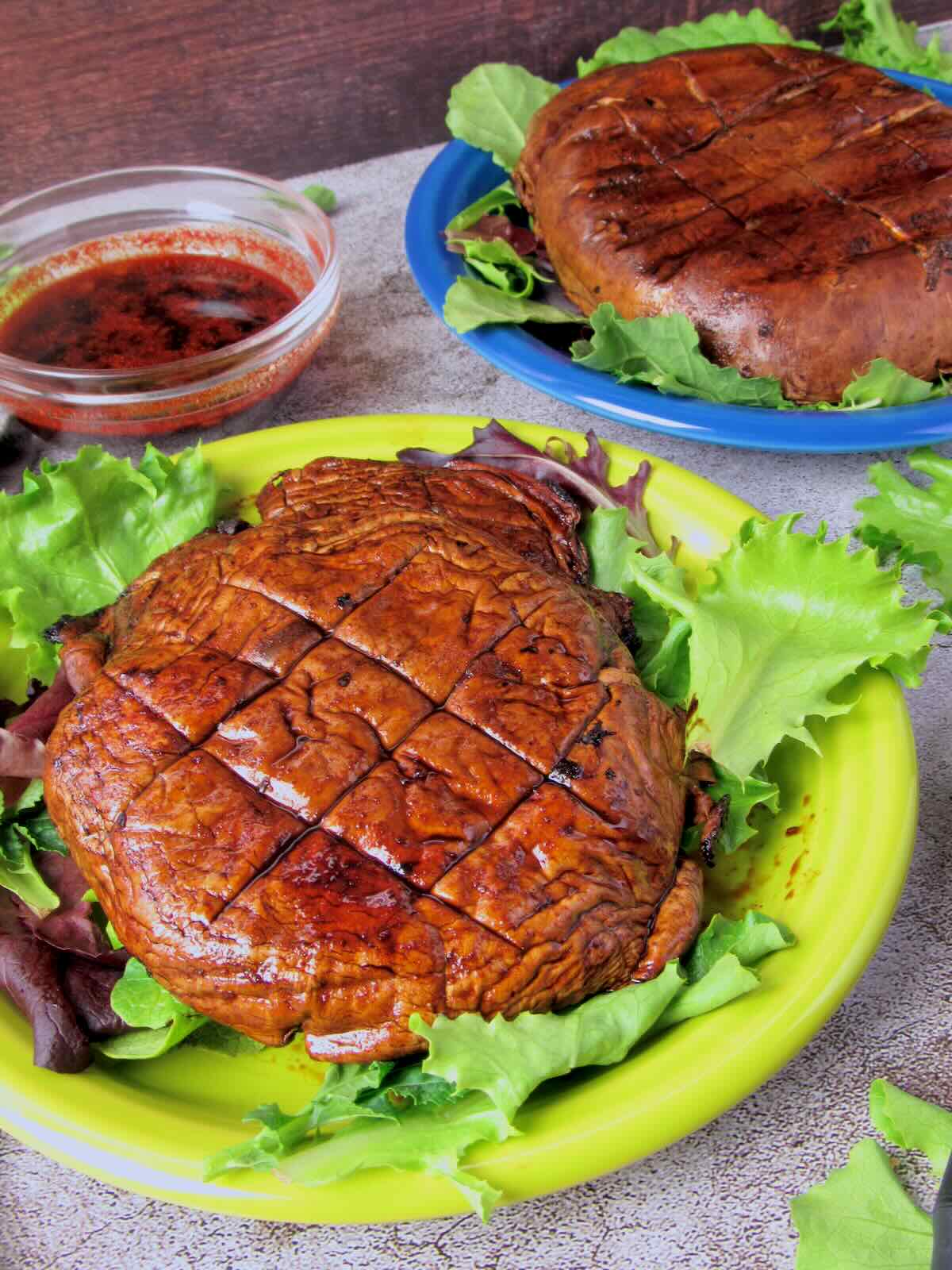 Vegan Grilled Portobello Mushrooms with fresh lettuce. 