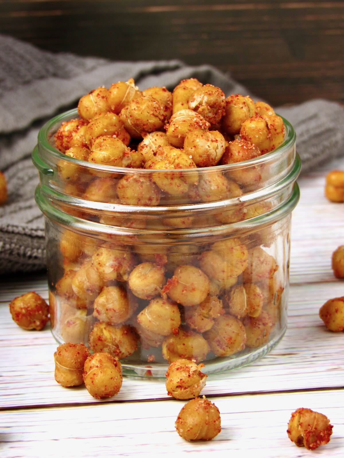 Crispy Air Fryer Chickpeas stored in a glass jar.
