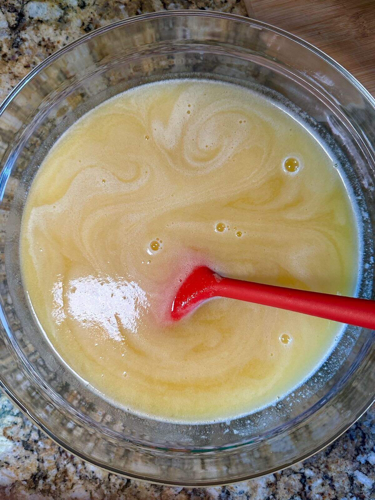 Mixing together homemade lemonade.