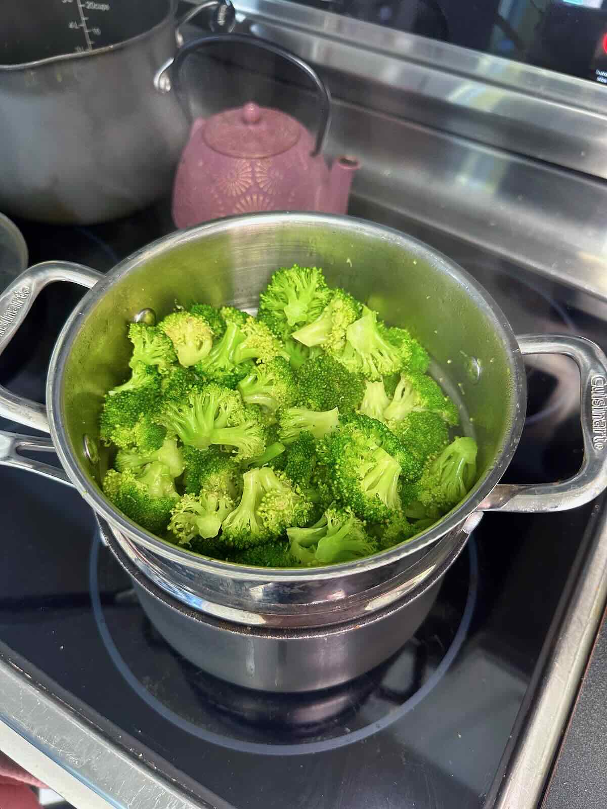 Steamed broccoli on the stovetop.