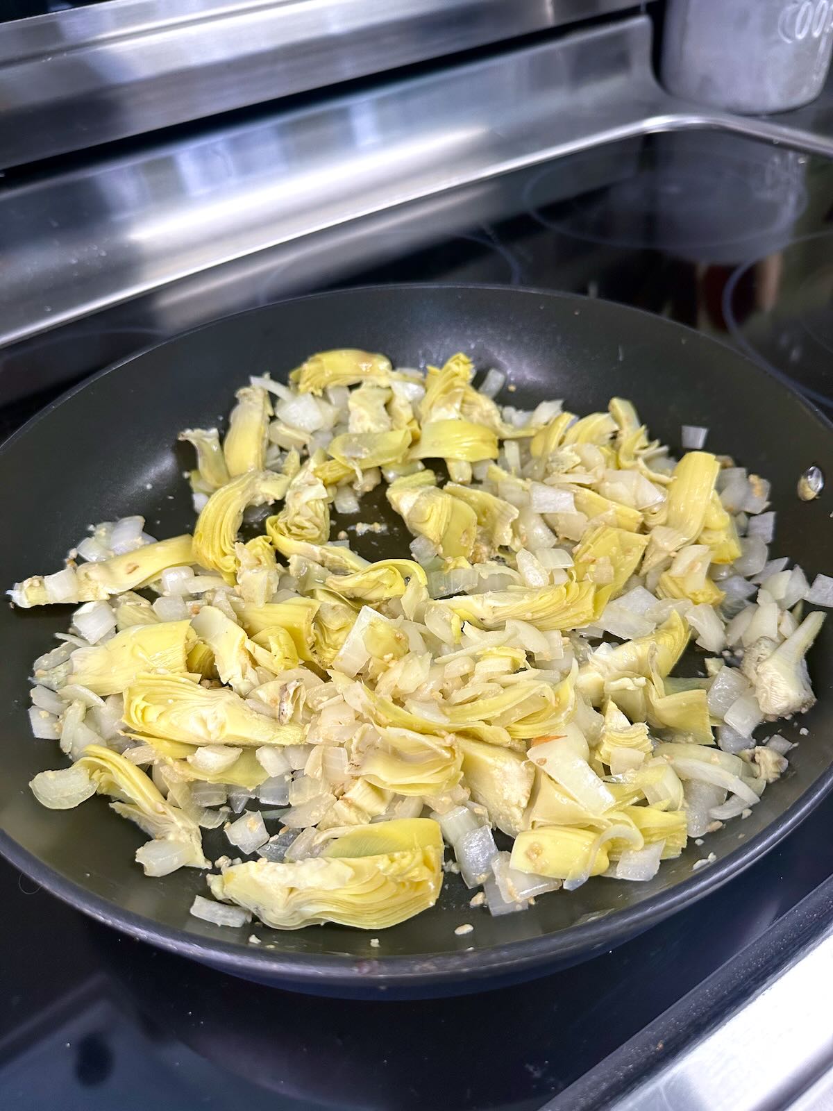 Oil-free sautéed onions and artichokes.