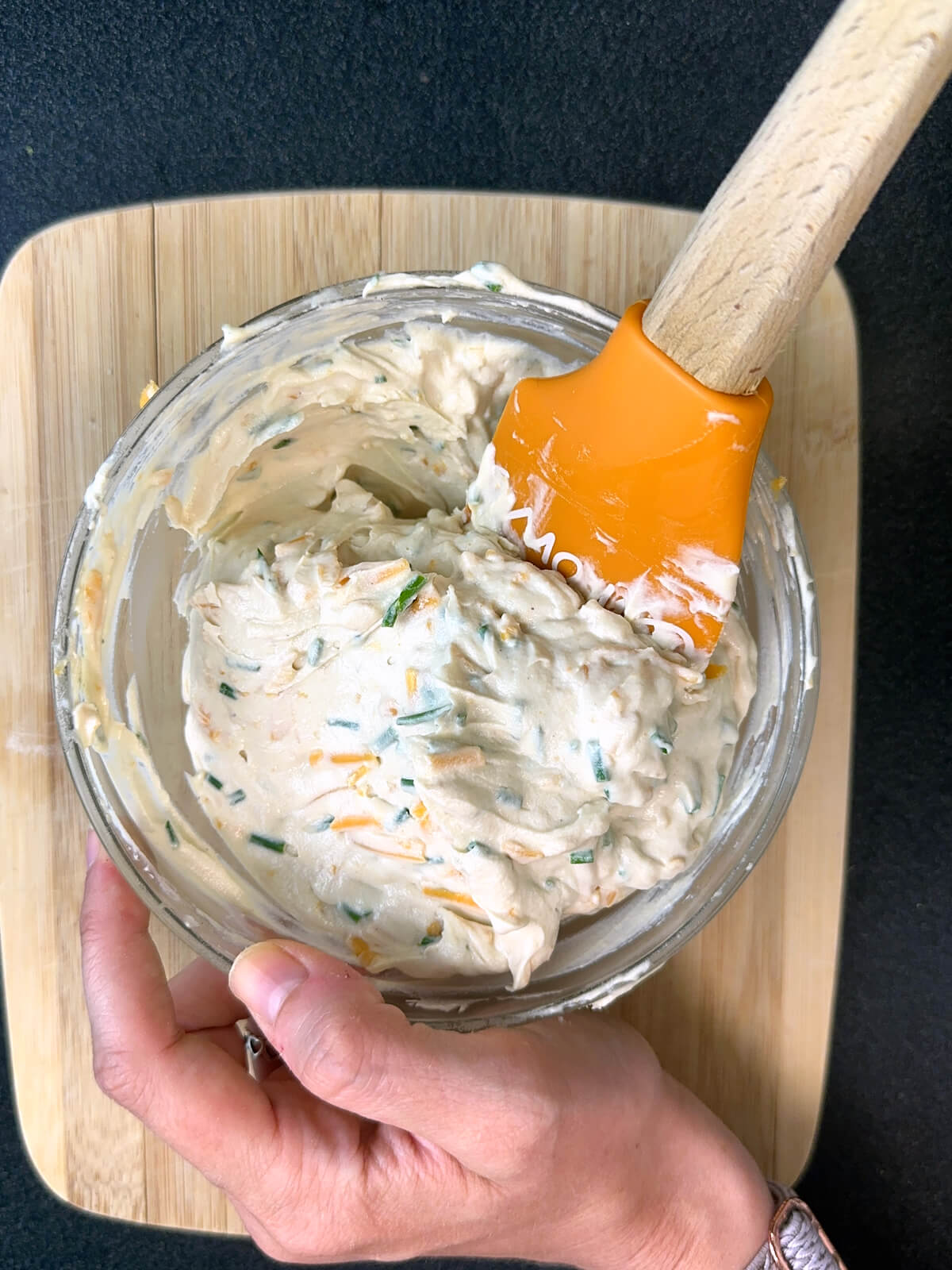 Mixing together a nondairy cream cheese filling.