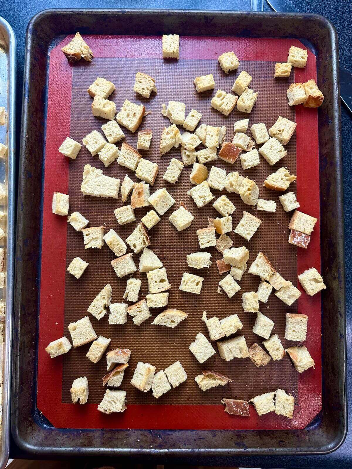 Toasting sourdough bread in the oven for Thanksgiving stuffing.